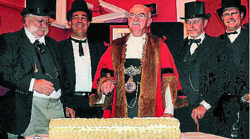 Mayor Ron Bellingham and councillors cut the 150th cake. Mayor Ron Bellingham and councillors cut the 150th cake.